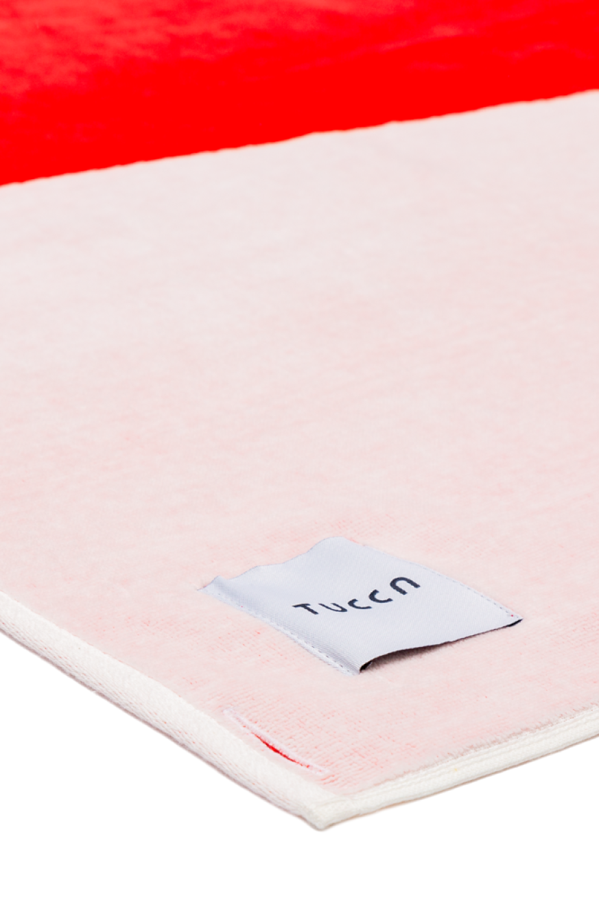 Detalle-Toalla-Tucca-Berry-rojo-turquesa-y-rosa